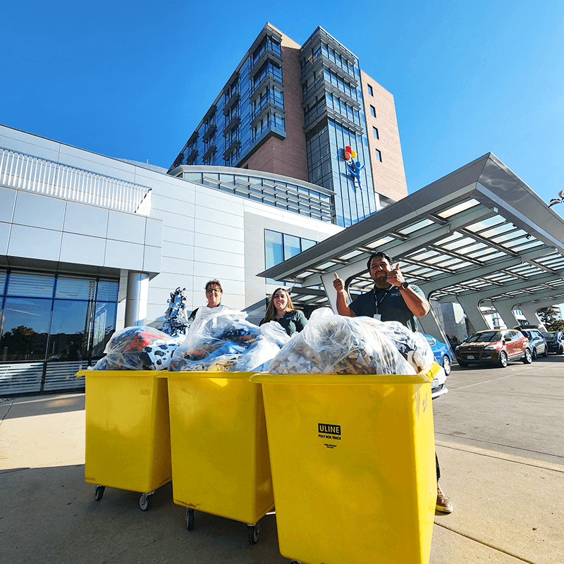 C·U·D team dropping off blankets at Children's Hospital