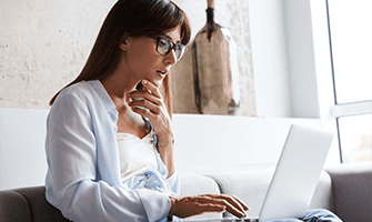 Young businesswoman on her laptop