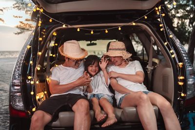 Happy family in car