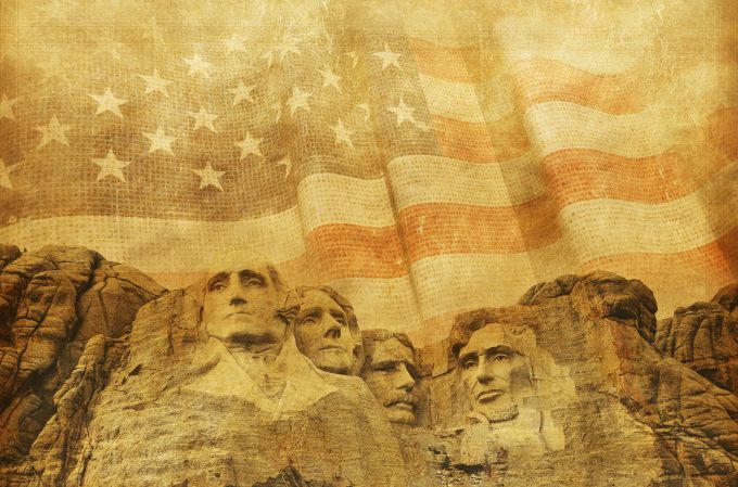 Mount Rushmore with US flag in background