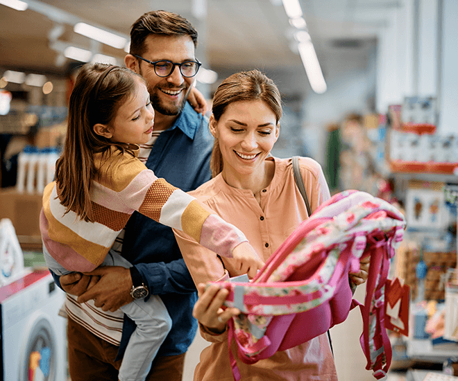 Family doing school supply shopping together.