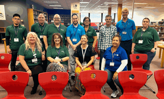 CUD employees volunteering at a local high school.