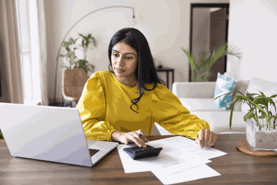Woman budgeting on her laptop