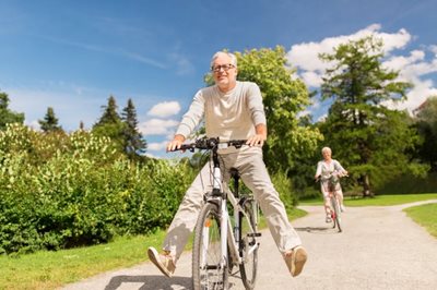 retired couple riding bikes