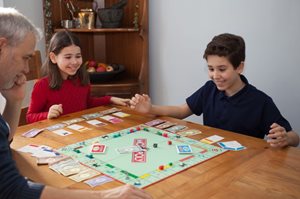 Family playing board games together