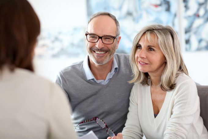 senior couple talks to a professional