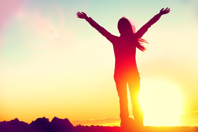 woman celebrates her success